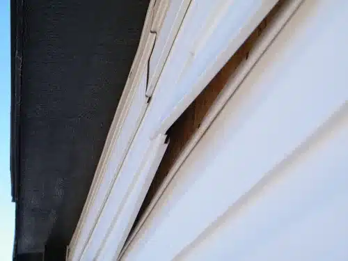 water damaged siding due to storms